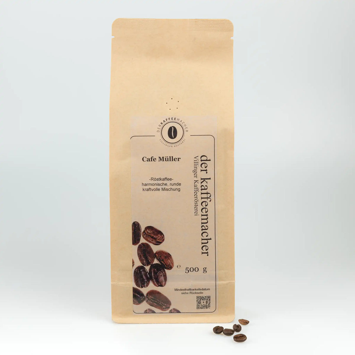 500 g Kaffeepackung aus braunem Kraftpapier von Der Kaffeemacher.
500 g coffee package made of brown kraft paper from Der Kaffeemacher.