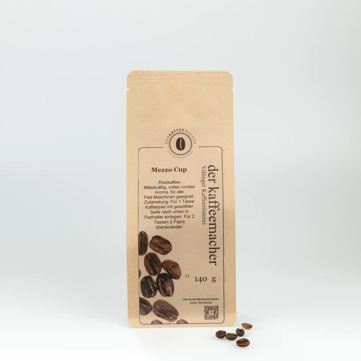 140g Kaffeepackung aus braunem Kraftpapier von Der Kaffeemacher.
140g coffee package made of brown kraft paper from Der Kaffeemacher.